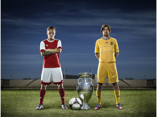 Image : Eugen Polanski and Artem Milevskiy with the UEFA Euro Trophy and Official Tournament Match Ball