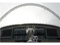 The adidas UCL Wembley Finale OMB on display with the UEFA Champions League trophy outside Wembley Stadium
