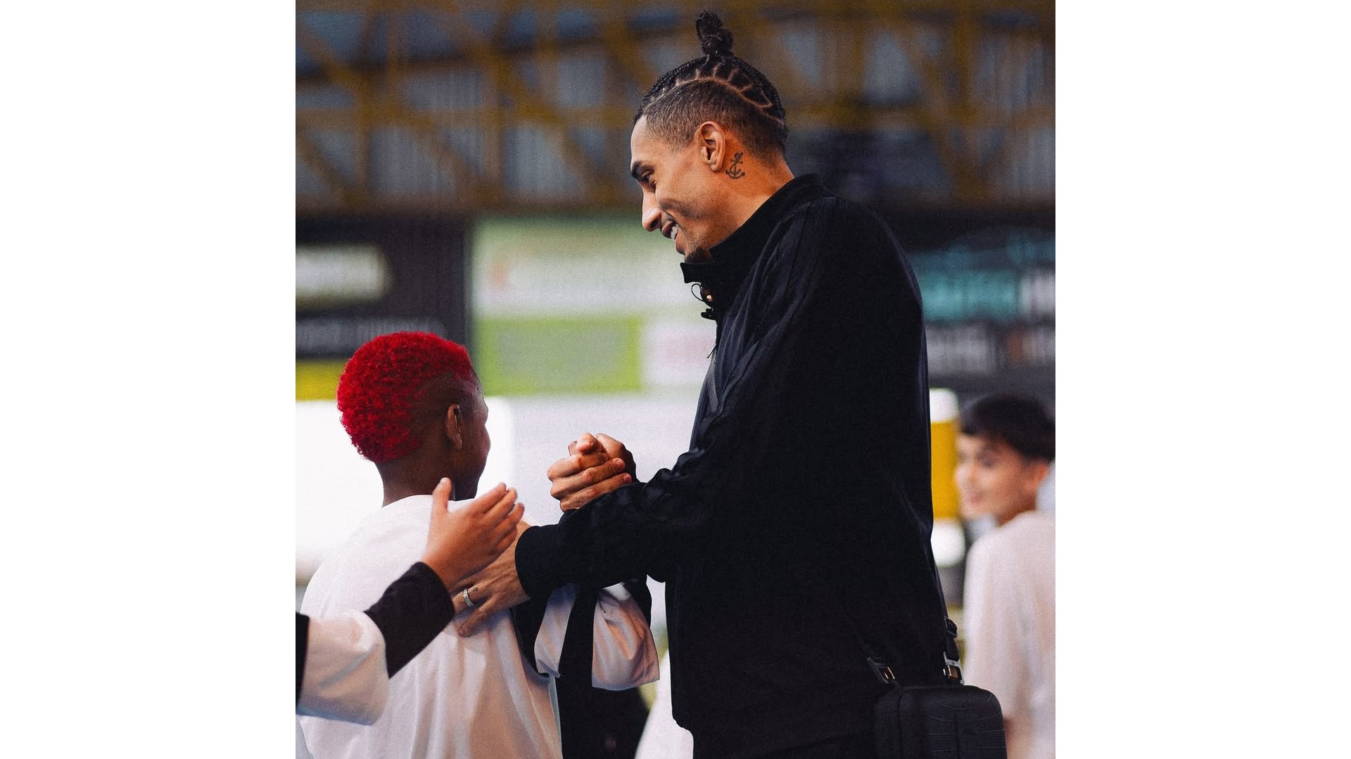 Brazilian football star Raphinha shows young footballers the power of sideline support and that we all need someone to m