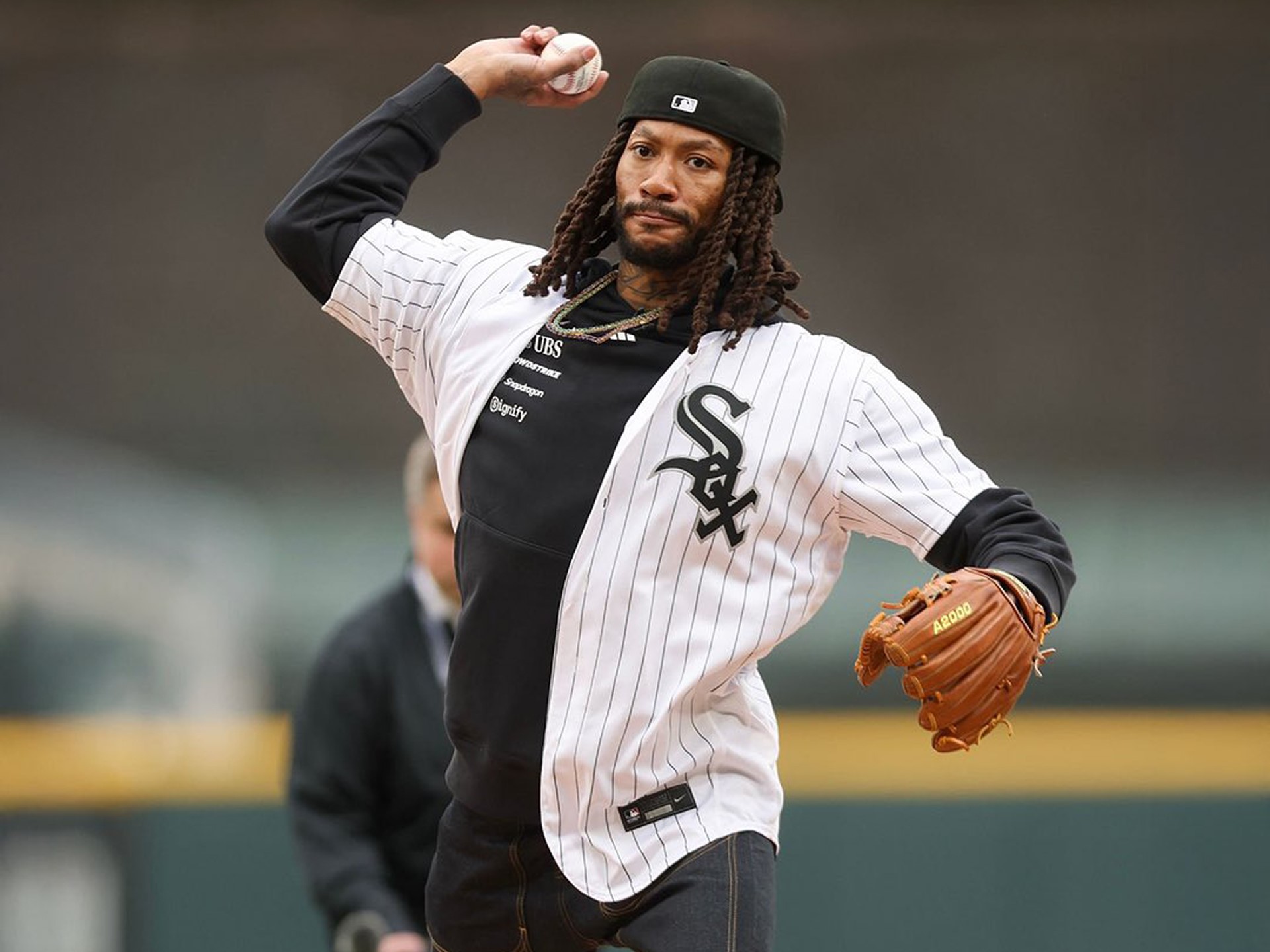 Derrick Rose threw out the first pitch at the White Sox season opener wearing his own adidas x Fear of God Athletics Bas