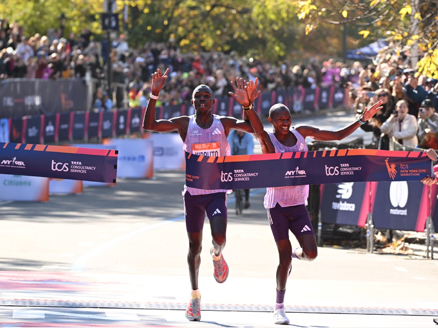 Four athletes Three Stripes and One franchise adizero take over New York Marathon all adidas men s podium and bron