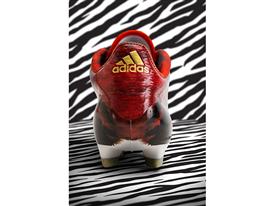 lion adidas cleats