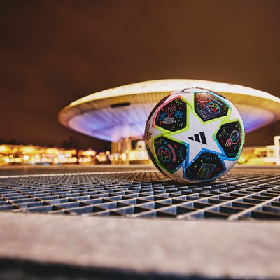THE OFFICIAL MATCH BALL OF THE UWCL KNOCKOUT STAGES. When the night closes  in, Eindhoven shines. The eye-catching graphics on this adidas