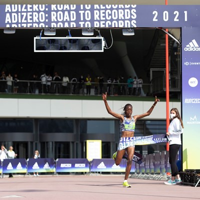 The late Agnes Tirop pictured winning the women s 10K race and breaking the women only world record at Adizero