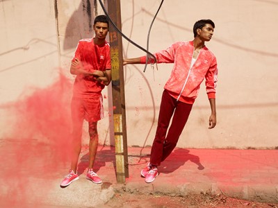 +H21254 adidas Originals PHARRELL WILLIAMS Hu Holi adicolor Key Visual Footwear Shot Red