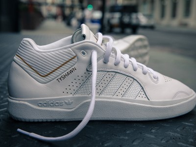 The Triple White colorway Tyshawn Signature shoe
