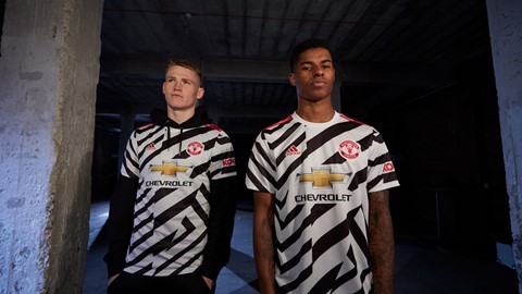 RASHFORD AND MCTOMINAY WEAR UNITED THIRD JERSEY
