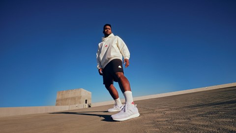 adidas sportswear FW22 - Men’s Fleece Hoodie layered over Oversized Tee and Fleece Shorts – Tua Tagovailoa
