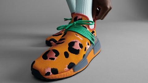 Hu NMD Cheetah Orange Drop Model Uncropped