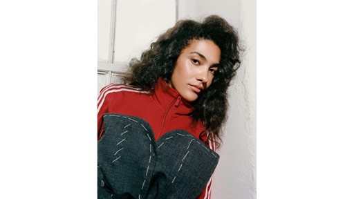 British singer Olivia Dean is NYLON s December cover star styled in adidas talking about love storytelling creative