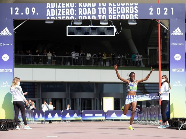 The late Agnes Tirop pictured winning the women’s 10K race and breaking the women-only world record at Adizero: Road to Records in 2021