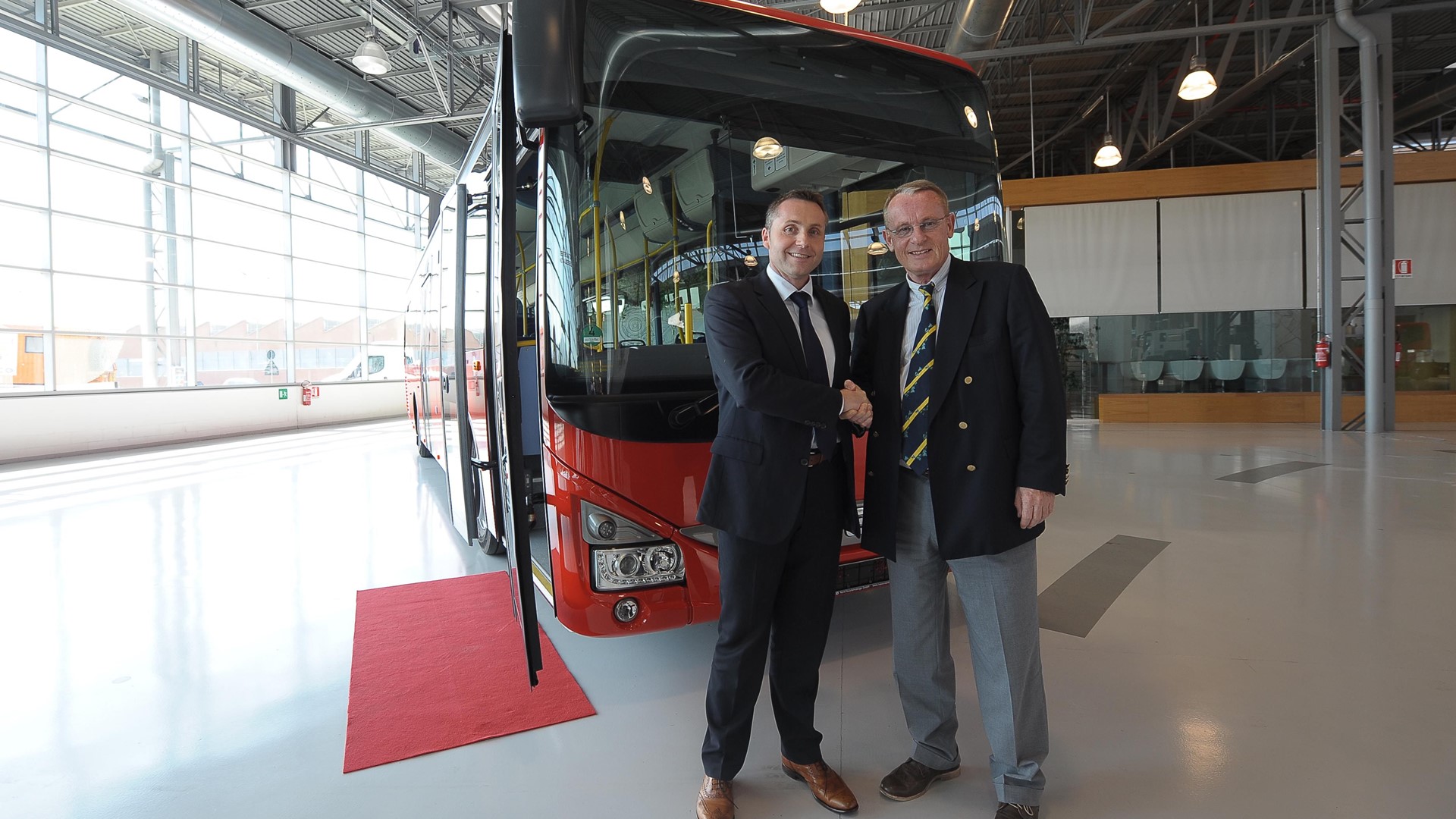 Head of Iveco Bus Sylvain Blaise with one of the Iveco Bus Crossways to be delivered to Deutsche Bahn