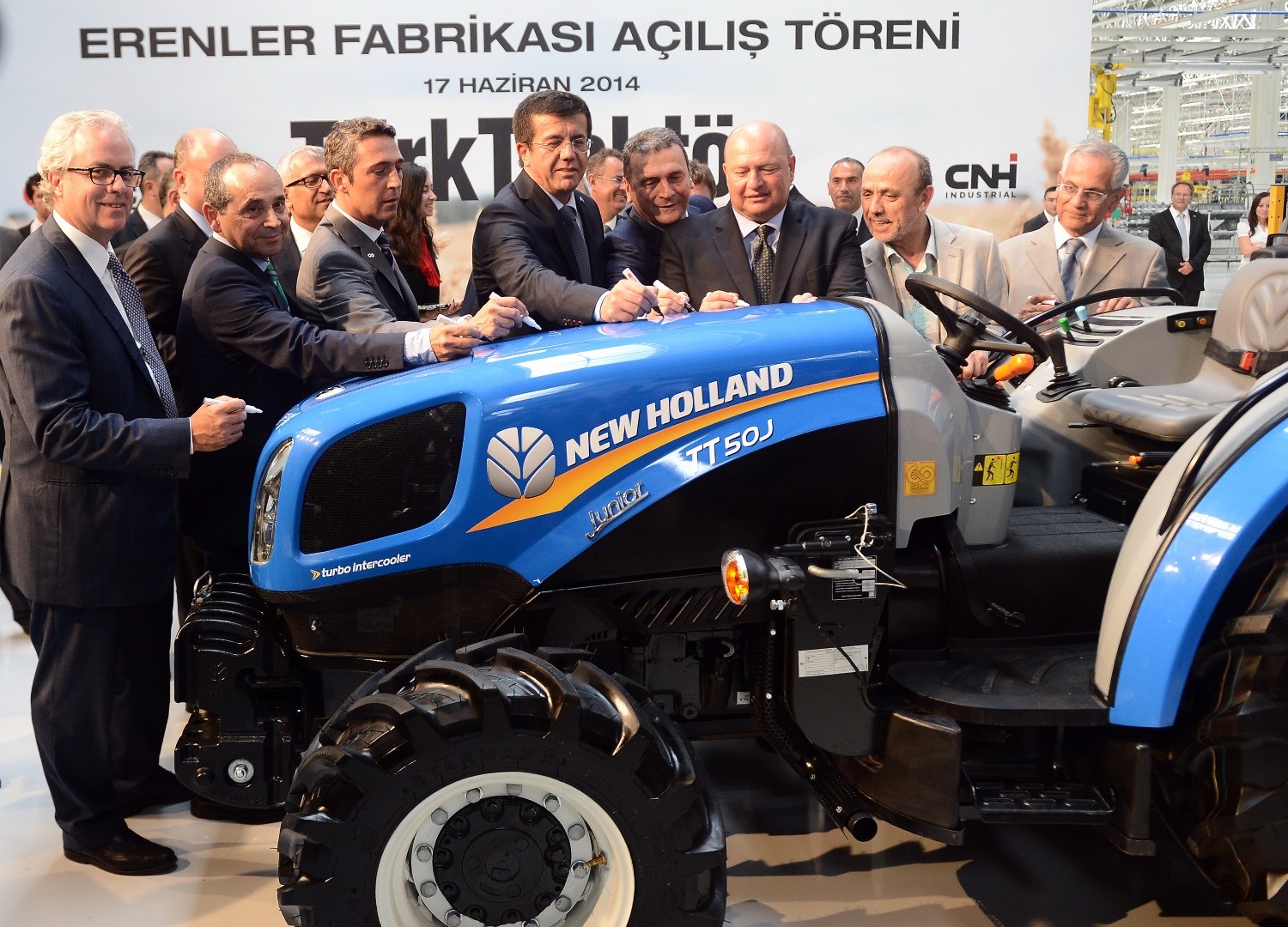 CNH Industrial CEO Richard Tobin (far left) and Chairman of the Board of Koç Holding, Mustafa V. Koç (third from right)