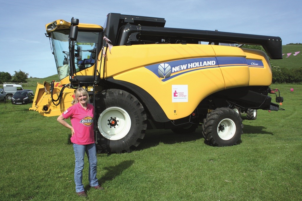 Judi finishes 174-mile journey on a New Holland CX5080 Combine Harvester for cancer charity
