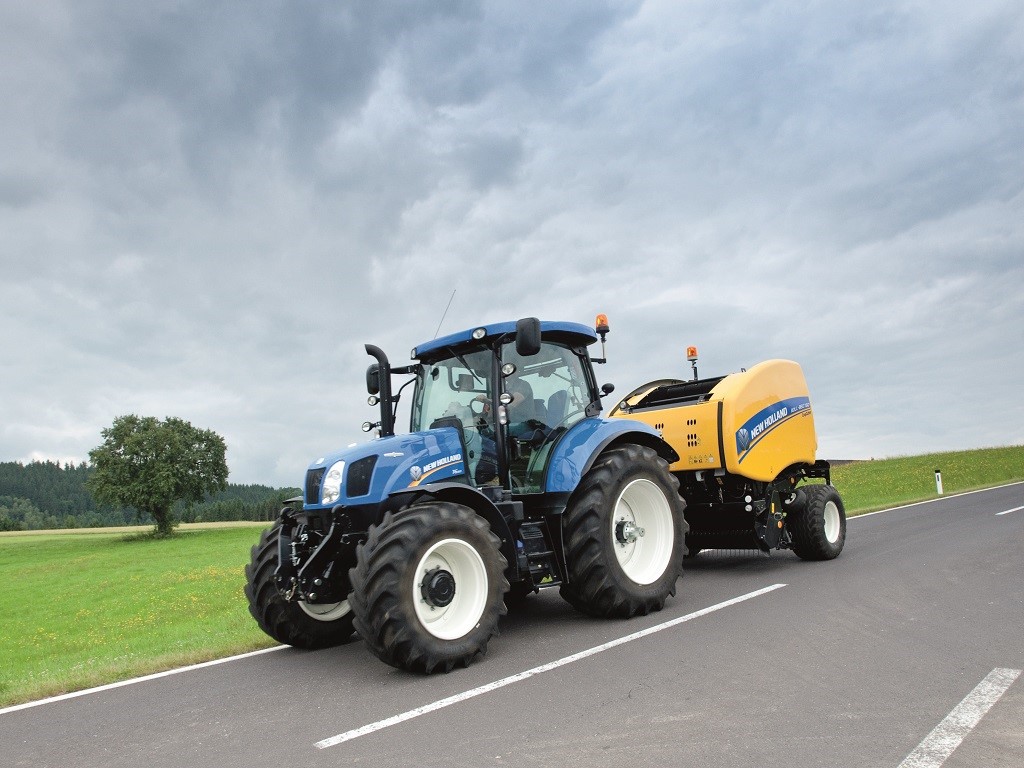 New Holland Roll Belt 150 CropCutter on the Road