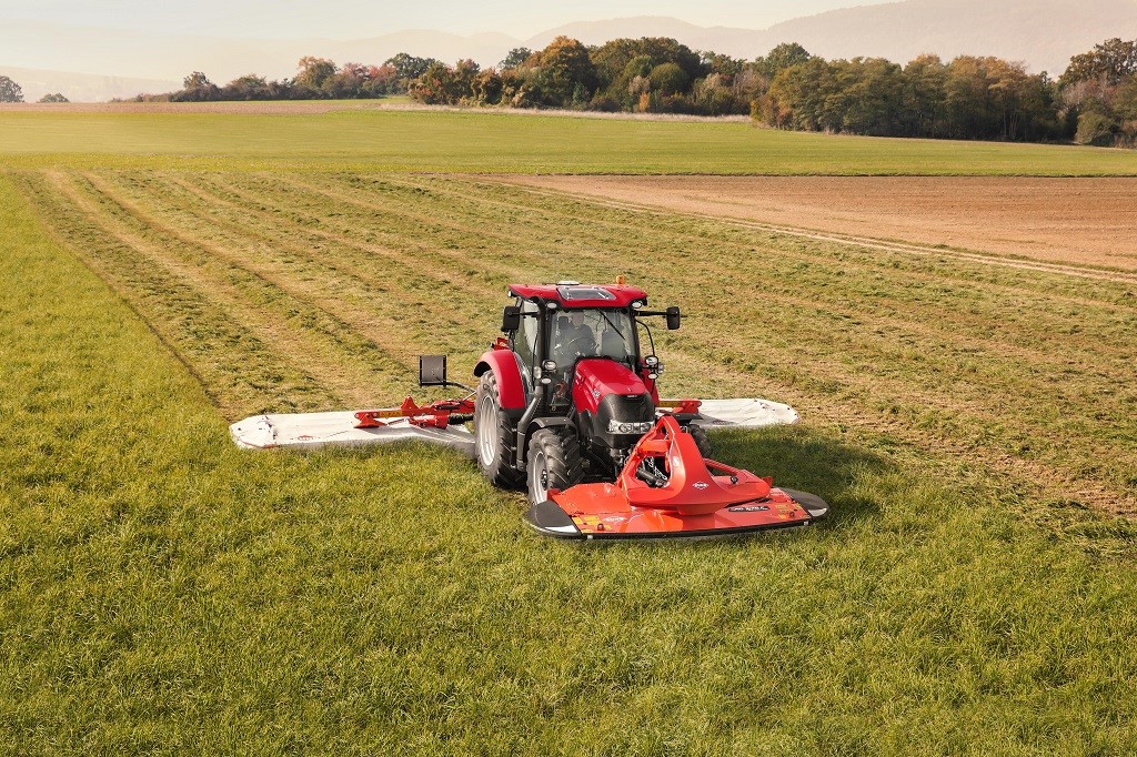 Case IH Maxxum Multicontroller Tractor with a triple mower