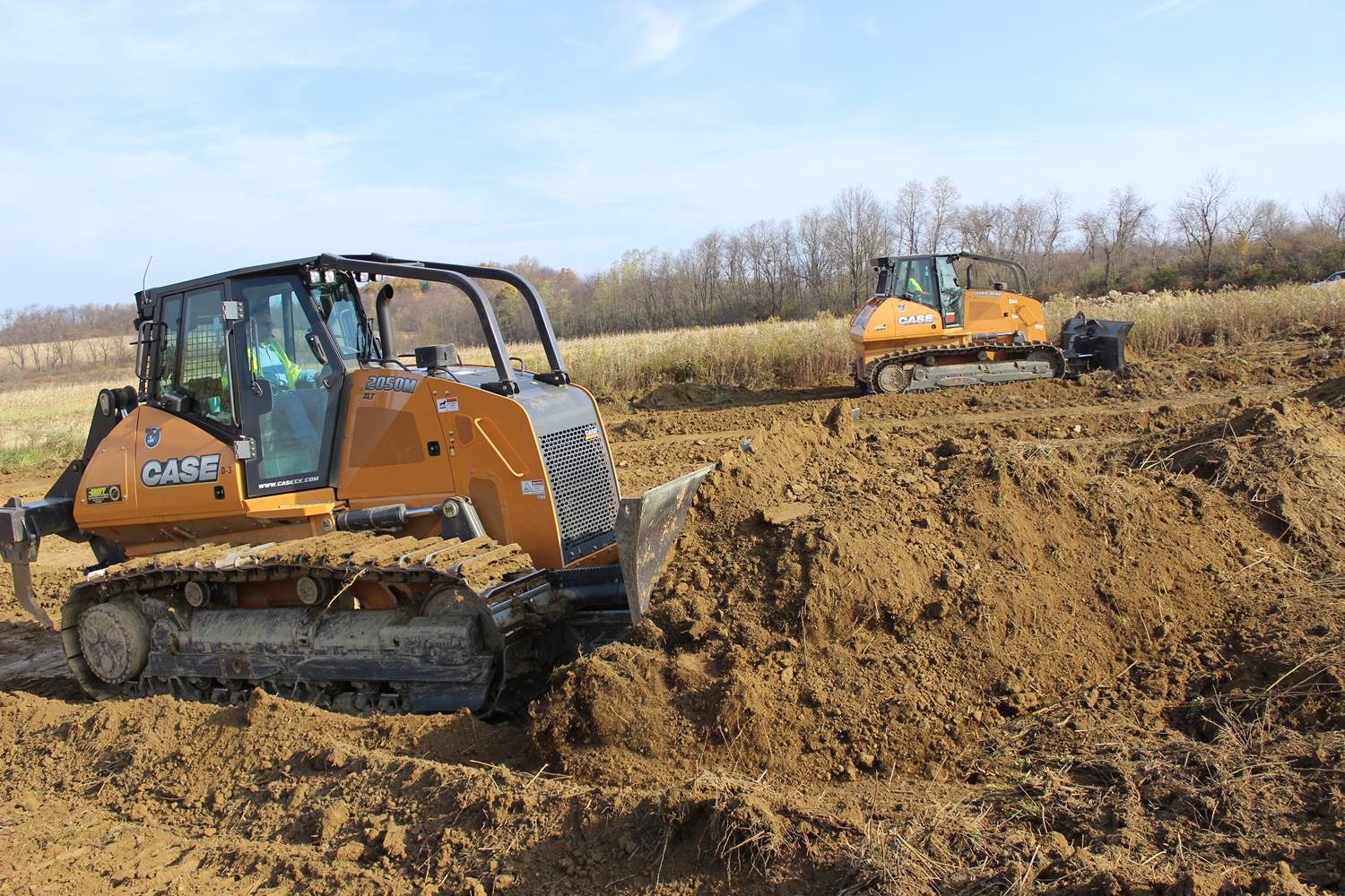 Steele Construction adds two new 214-horsepower dozers for well site earthmoving and reclamation.