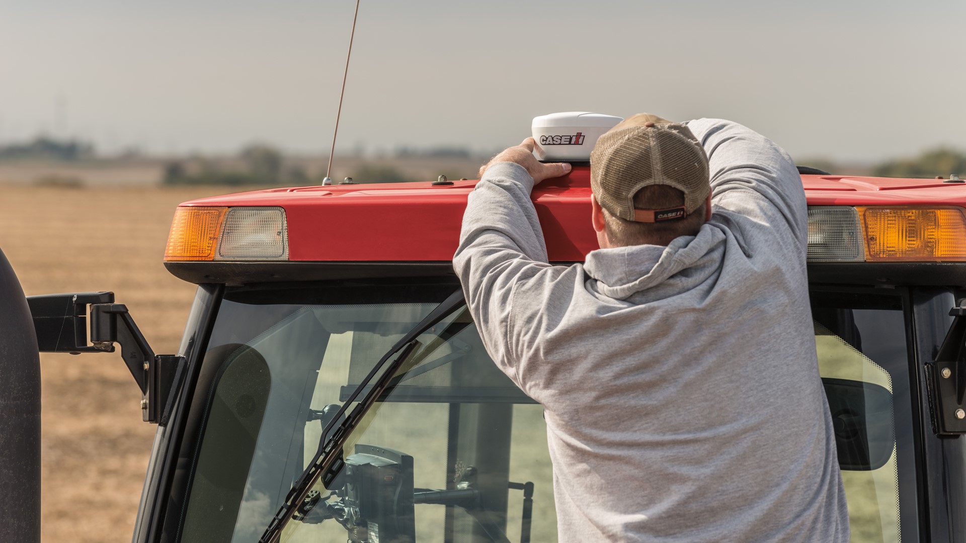 The new AccuStar GPS receiver can equip  late-model tractors or combines with guidance capabilities