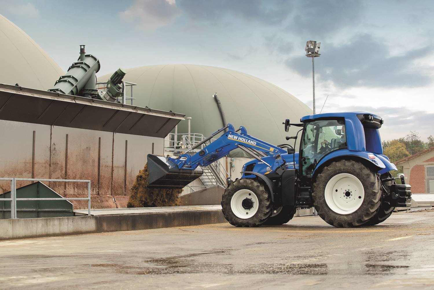 T6 Methane Power tractor prototype loading the biodigestor