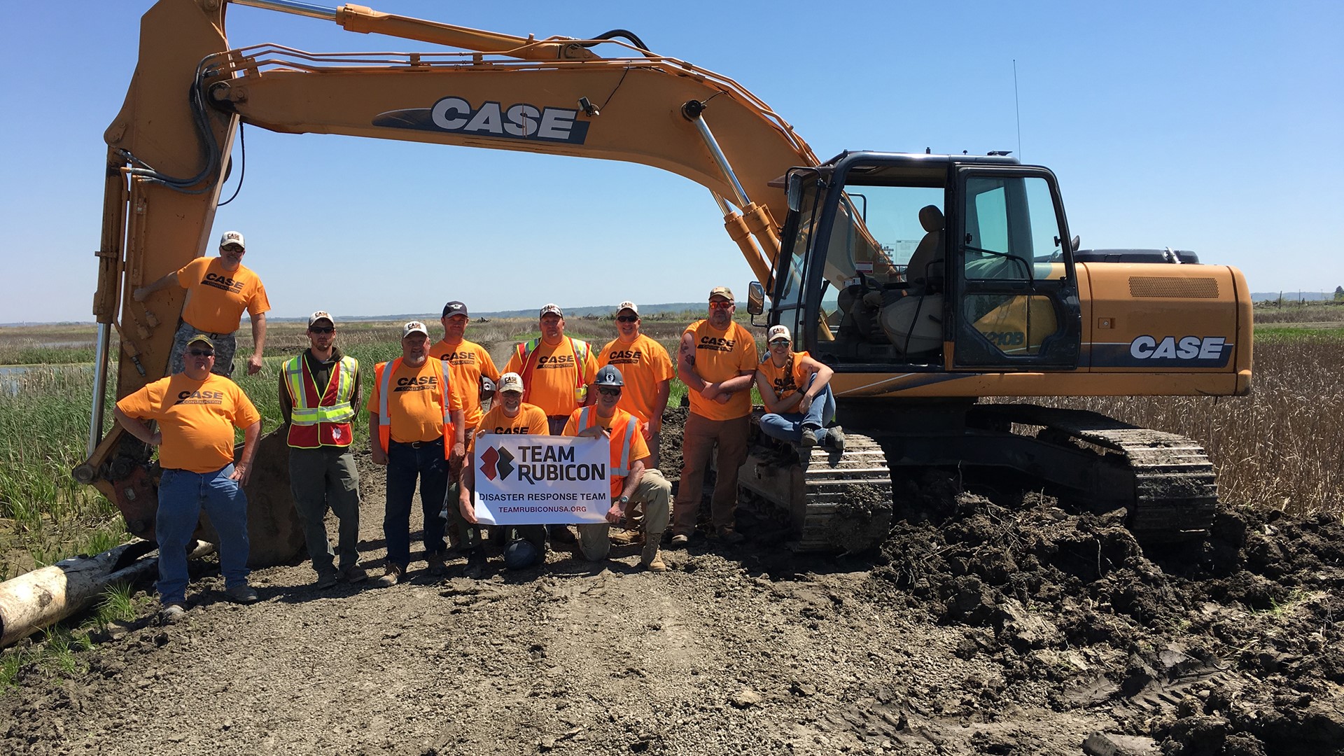 CASE Construction Equipment  CX210C crawler excavator working with Team Rubicon