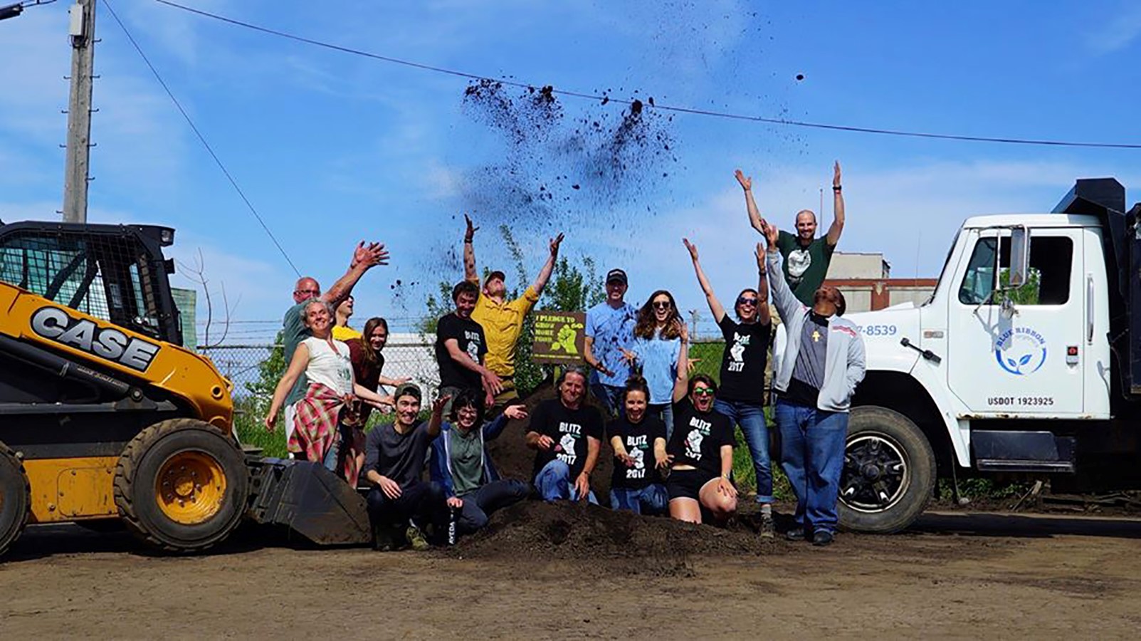 Victory Garden Initiative volunteers celebrate after installing 514 gardens