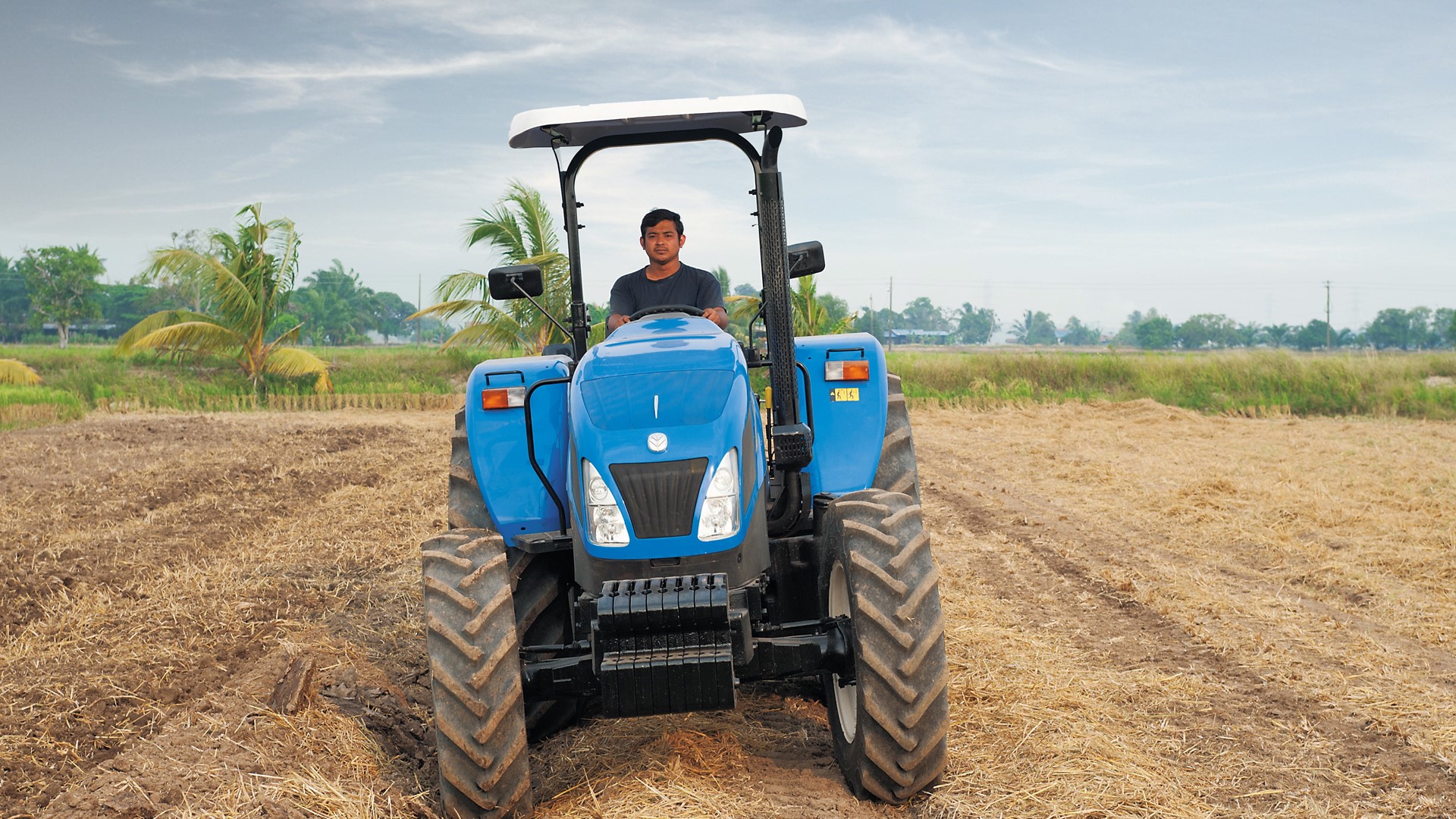 A New Holland TT4 Series tractor at work