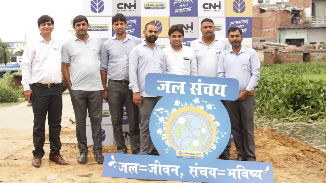 Representatives from CNH Industrial and its New Holland Agriculture brand proudly display the CSR project logo
