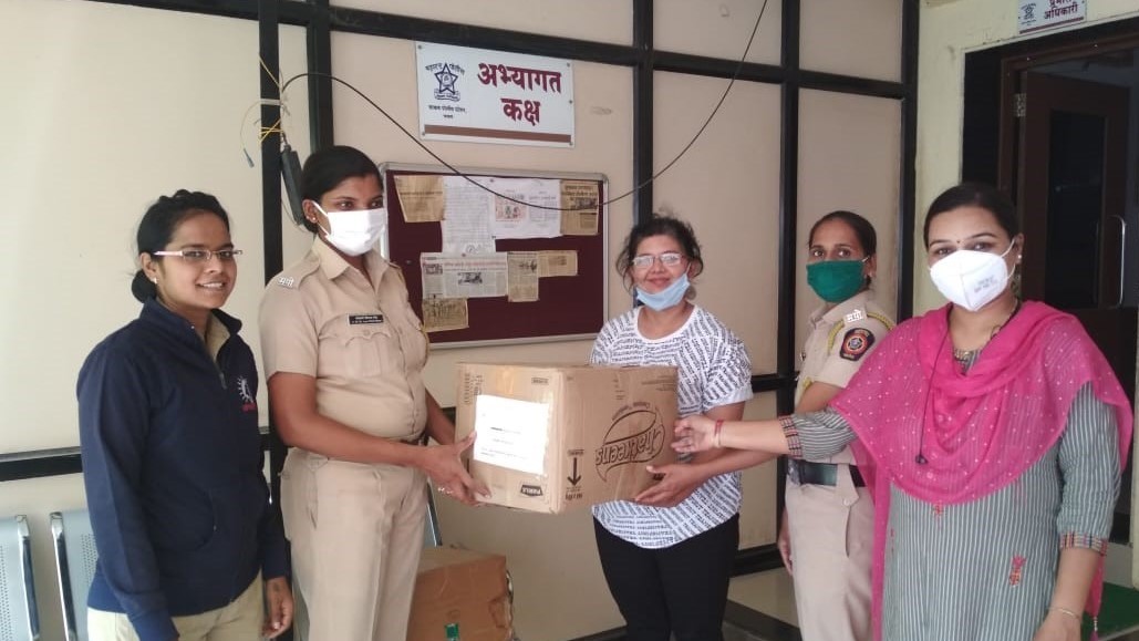Dropping off donation of sanitary supplies at the Pune Chakan police station