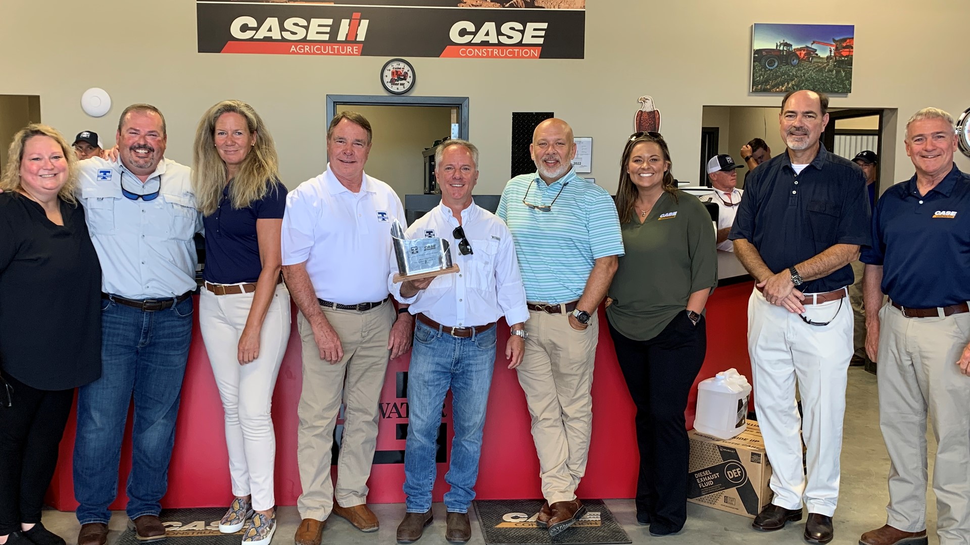 CASE and Tidewater officials join with local dignitaries to celebrate the opening of the new facility in Enterprise.jpg