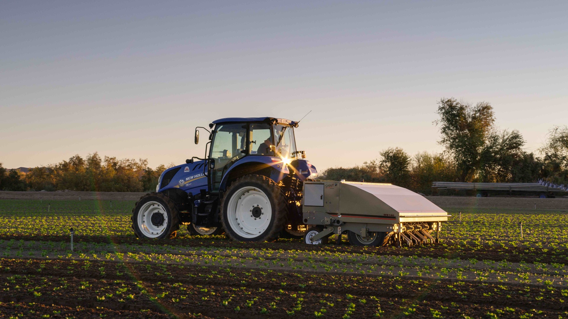 Stout Smart Cultivator with New Holland T5 Tractor