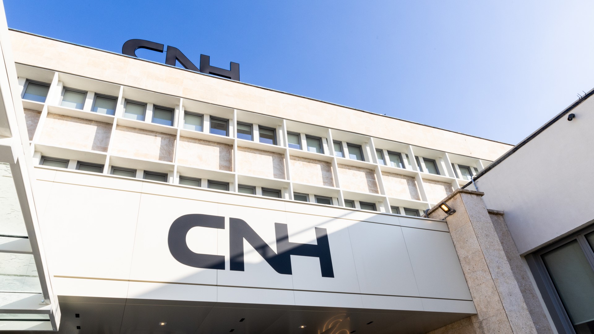 CNH logo image on building