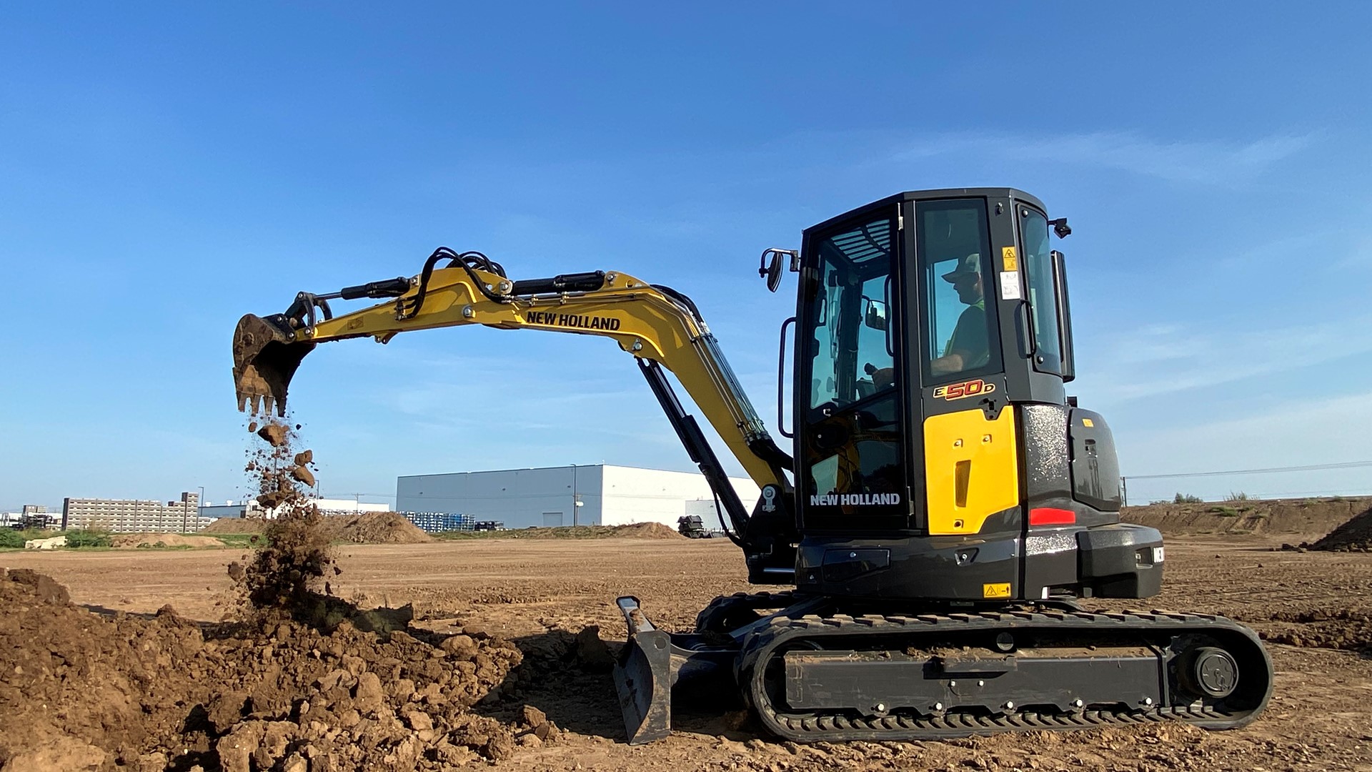 new-holland-construction-unveils-d-series-mini-excavators--built-in-house-and-designed-for-operator-