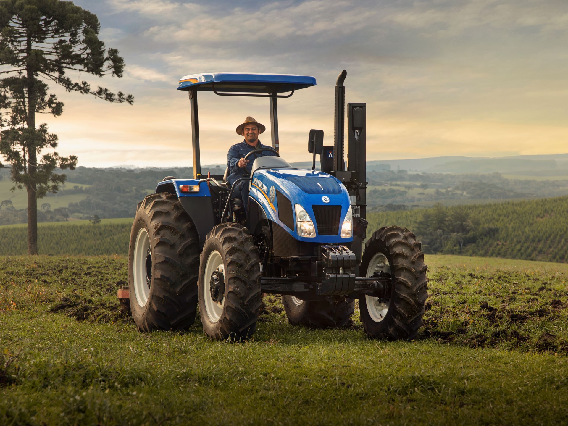 Farmer and machine hard at work