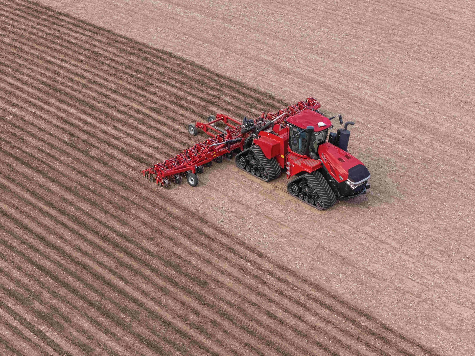 Steiger 645 Quadtrac with Nutri Tiller 1000 series strip til