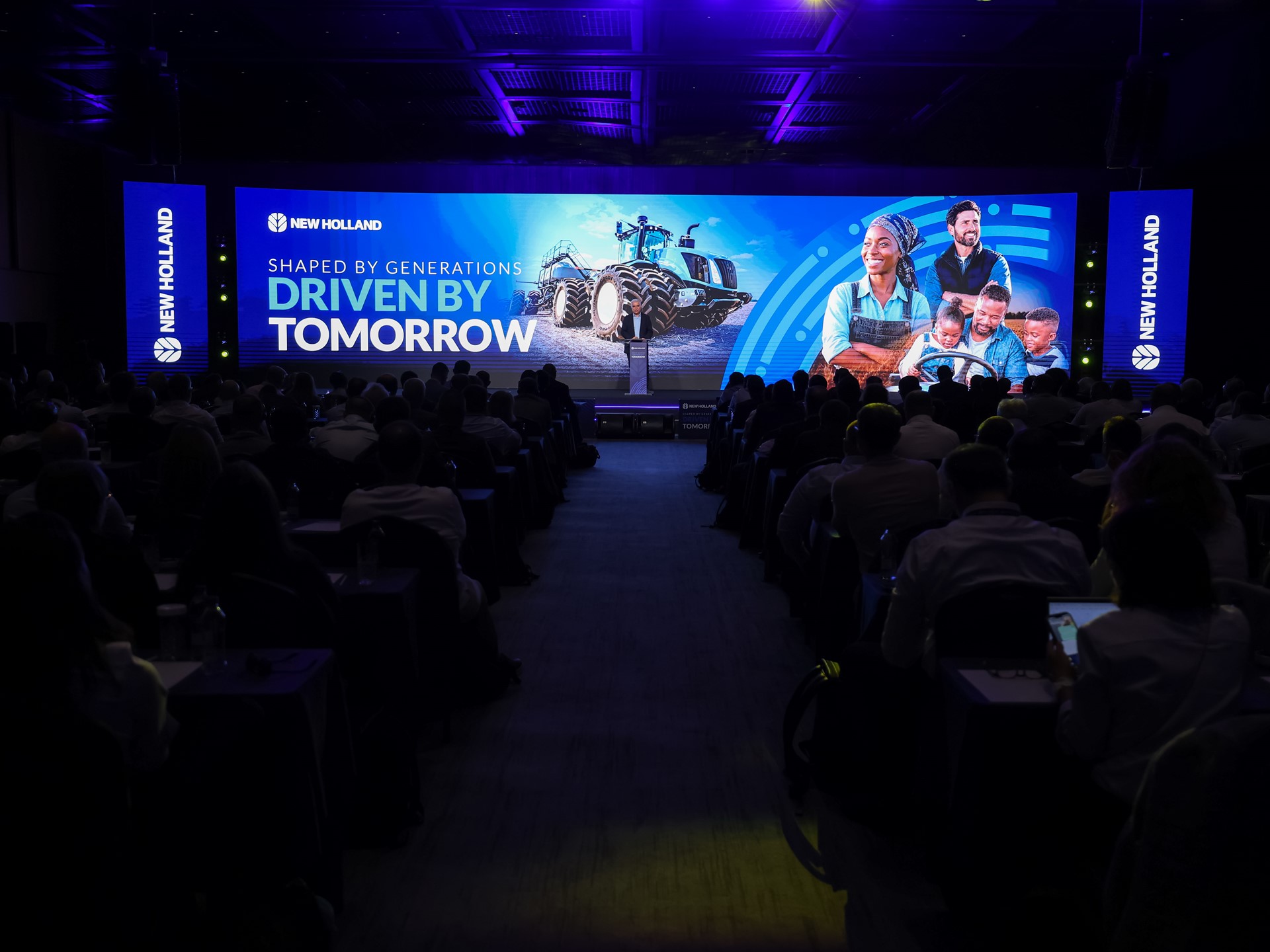 Ozkan Eren speaks at the New Holland Convention