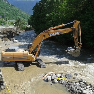 Case CX350 crawler exavator repairing riverbanks following European flooding