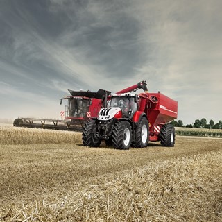 Steyr 6300 Terrus CVT with a chaser bin