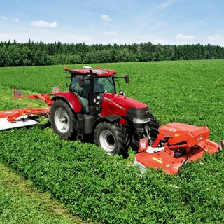 Case IH Puma 185 CVX with a butterfly mower