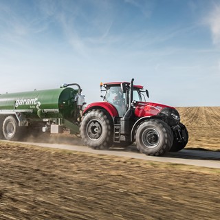 Case IH Optum 300 CVX with slurry tank on the road
