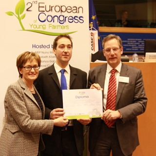 Sean Coughlan is pictured (centre) with Irish Project MEP Mairead McGuinness and Matthew Foster, Vice President of Case