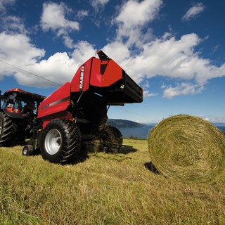 RB Fixed Chamber Round Baler working