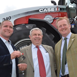 Bob Vaughan (centre) being presented with keys from Phil Vickery (left) with Cheffins auctioneer Bill King (right)
