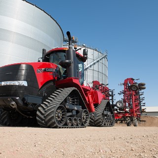 Quadtrac with tillage equipment in transport mode