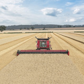 Axial Flow combine working with AccuGuide RTK Technology