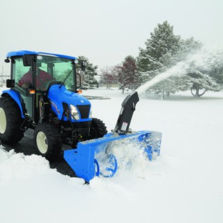New Holland Boomer™ 54D EasyDrive snow blowing