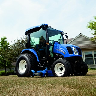 New Holland Boomer™ 54D EasyDrive mowing the lawn