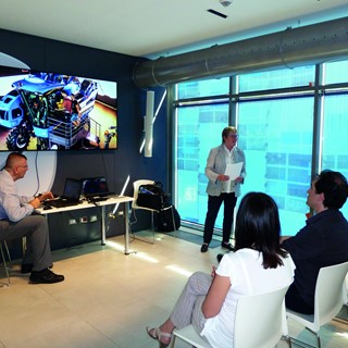 Annemie Lievens, Brand Communications Director at New Holland Agriculture, welcomes the Domus students
