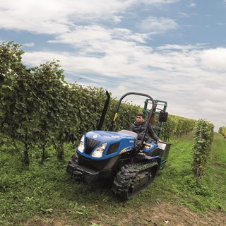New Holland TK 4030F Tractor in an orchard