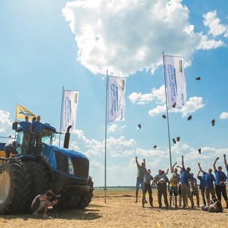The Team celebrate the world record for manure spreading set with the T9 and Brochard Constructeur