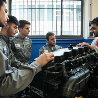 Students of the TechPro2 program learning about an FPT Industrial engine used for agricultural machinery